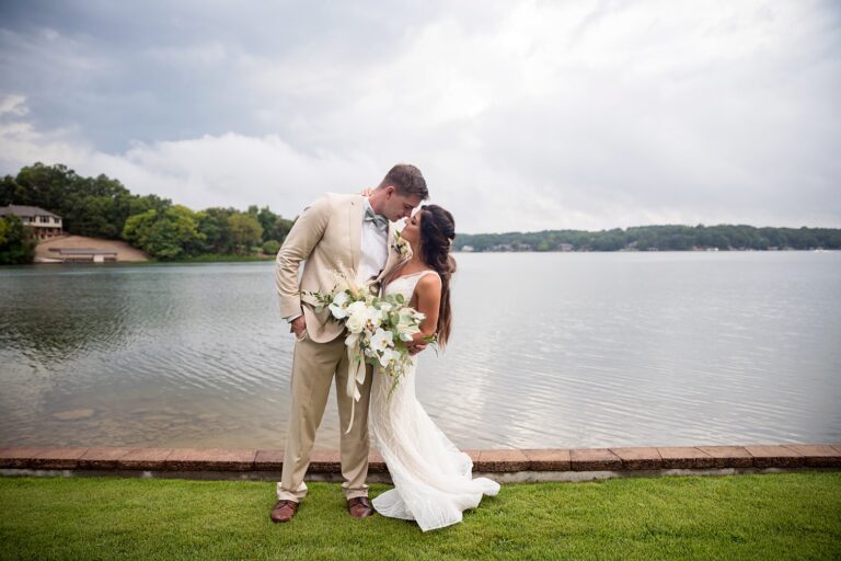 bride and groom beside lake pic 2 768x512