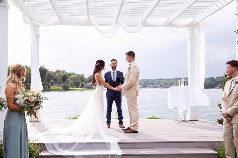 bride and groom ceremony on pergola 2021 pic 2 768x512
