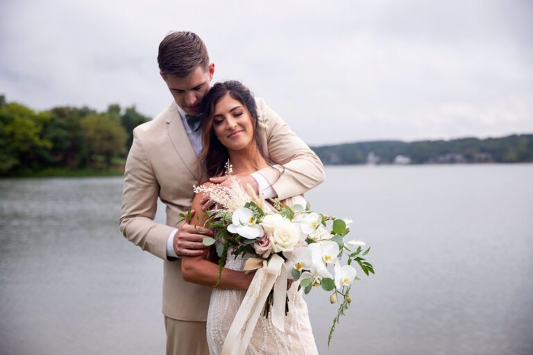bride and groom lakefront portrait pic 2 768x512